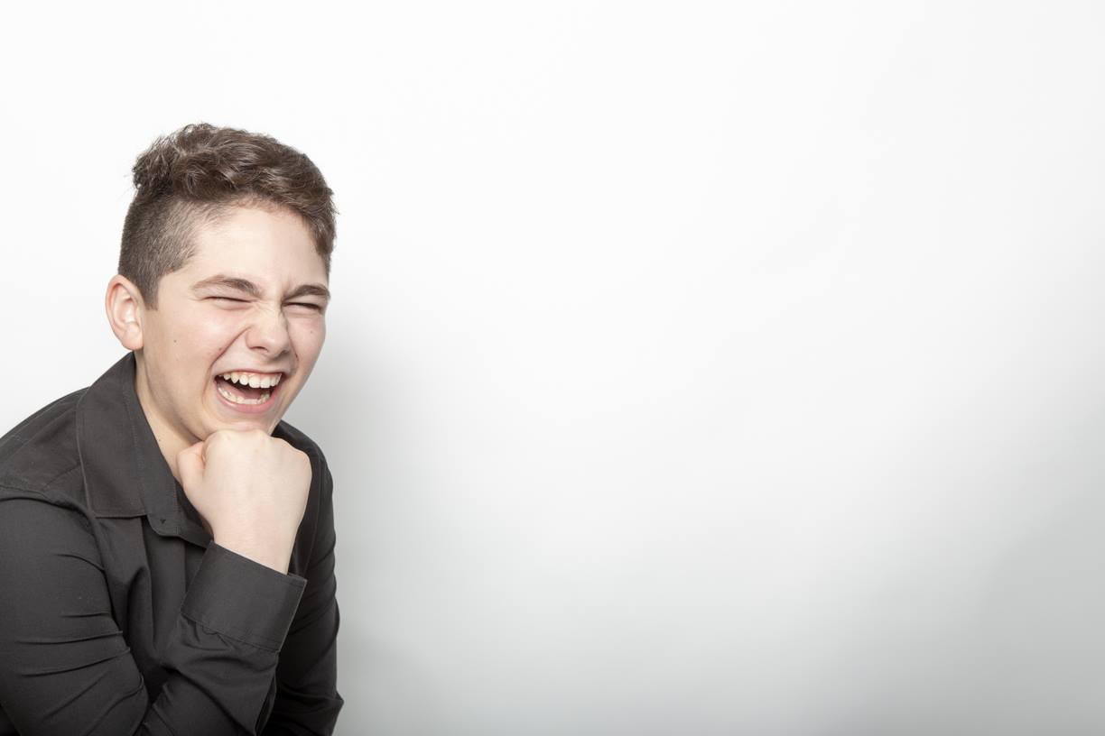 Candid Boy Laughing Portrait - Authentic Photography
